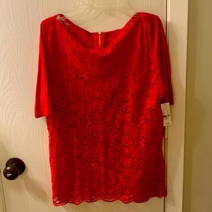 Light weight red top, zipper halfway in back.